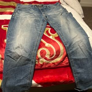 Used buckle jeans
